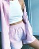 Casual Striped Two-Piece Set: Long-Sleeved Shirt & Wide-Leg Pants with High-Waist Shorts.