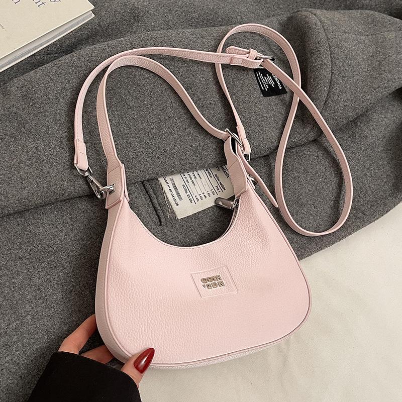 

Wholesale new Korean version niche simple commuter underarm crescent bag fashionable versatile sweet solid color messenger bag women
