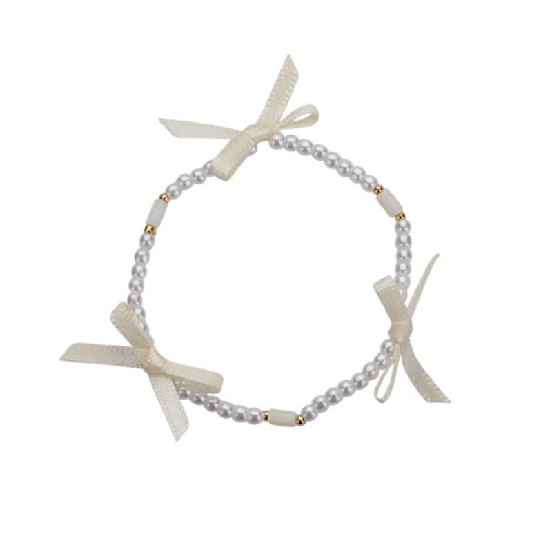 Charmy Triple Ivory Ribbon Pearl-bracelet