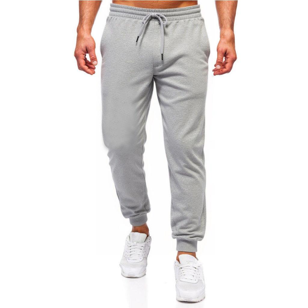 Spring and Autumn New Men's Solid Color Casual Sports Running Pants Tether Elastic Waist Tights