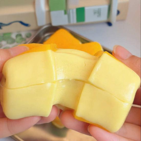 Yellow Rice Cake Squeeze Toy Stress Anxiety Relief Stretchy Rice Cake Stress Toy Portable Simulated Food Decompression