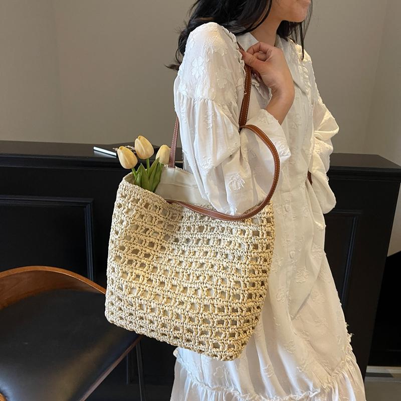 Handwoven Straw Tote Bag with Leather Handles and Open Weave Design Perfect for Summer Beach and Casual Outings