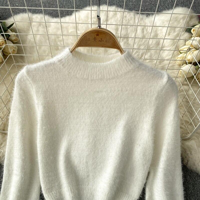 Autumn And Winter Fashion Short Long-Sleeved Knitted Sweater + Hip Short Skirt Two-Piece Set