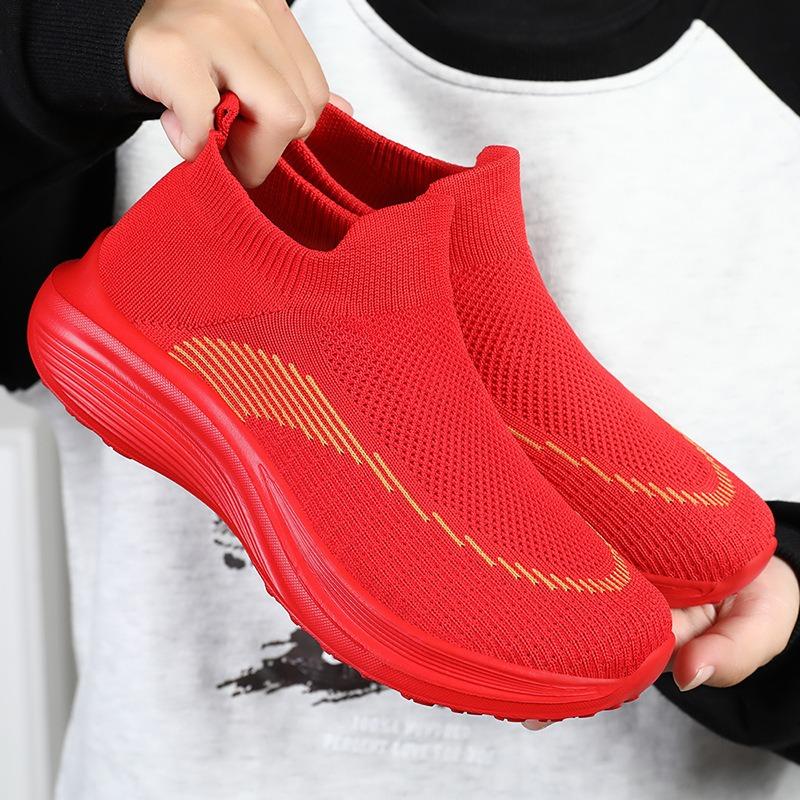 Women's shoes spring and summer women's new flying knitting light soft-soled sneakers breathable one-foot slip socks shoes running shoes wholesale