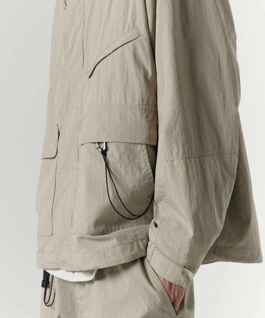 Musinsa Standard [City Leisure] Cn Hooded Windbreaker Jacket [Grayish Beige]