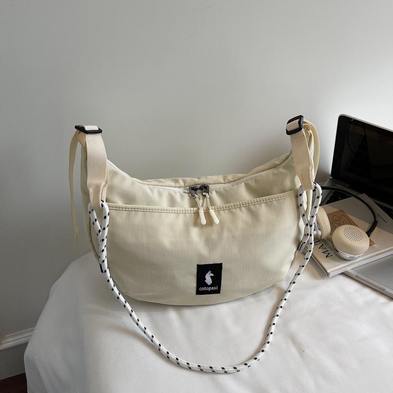 

2025 Autumn New Fashion Western-style Shoulder Bag Niche Design Korean Solid Color Dumpling Bag Solid Color Armpit Bag бежевий