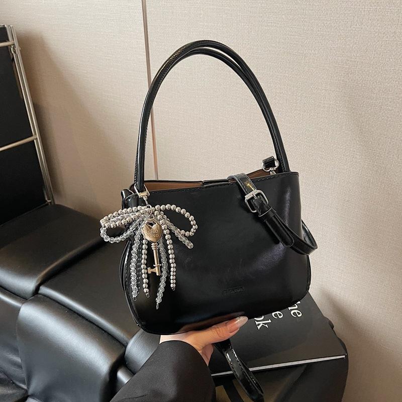 Simple Portable Bucket Bag Spring New Fashion Trend Niche Solid Color Shoulder Messenger Bag