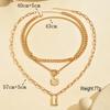 Elegant Embossed OT Buckle Three-Layer Necklace Set for Women