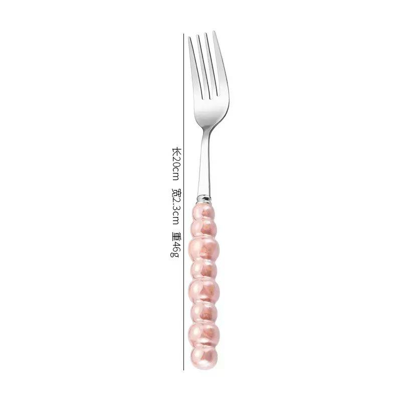 Norse Luxe Ceramic Pearl Cutlery Set: Fork, Knife & Spoon in Elegant Stainless Steel