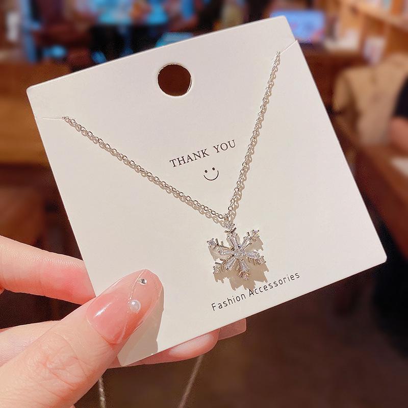 Trendy Zircon Snowflake Rotatable Necklace - High-End Titanium Steel Clavicle Chain
