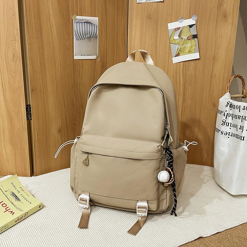 Japanese simple schoolbag female college student versatile junior high school student backpack male large capacity leisure travel backpack tide