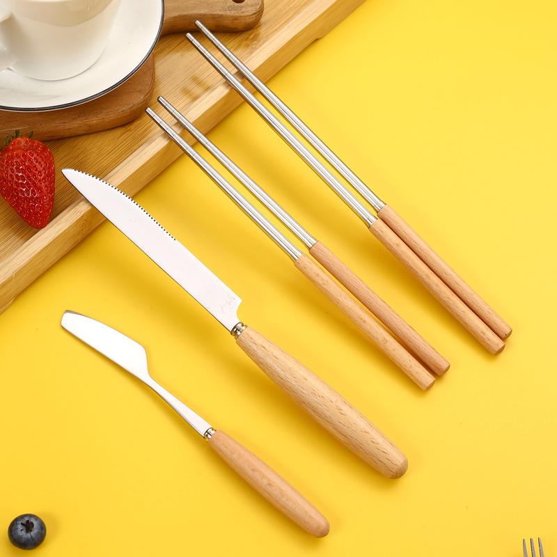 Rustfritt stål trehåndtak Knivgaffel Hjemmerestaurant Frukt Isskje Suppe Risskje Spisepinner Bestikk til kjøkkenbestikk