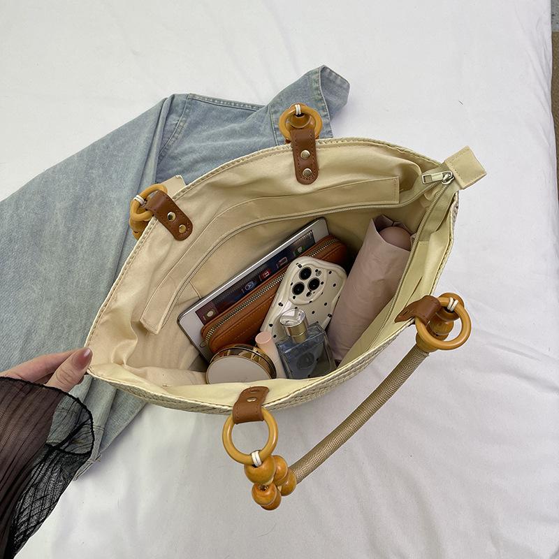 Urlaub Meer Strandtasche Temperament Einfache gewebte Einkaufstasche Große Kapazität Lässige Schulter Strohtasche