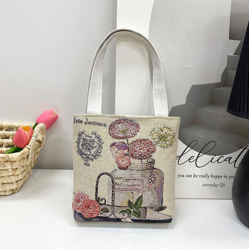 Stile etnico femminile da turismo ricamo elefante piccola borsa a mano fiore intrecciato borsa a tracolla in tela borsa per studenti quattro stagioni