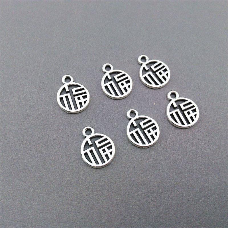 Tibetan Silver Clover & Bell Charm Bracelet with Pendant