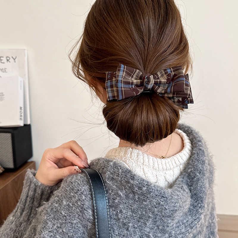 2024 Retro Double-Sided Bowknot Leopard Print Claw Clip: High-End Women s Hair Accessory for Autumn and Winter