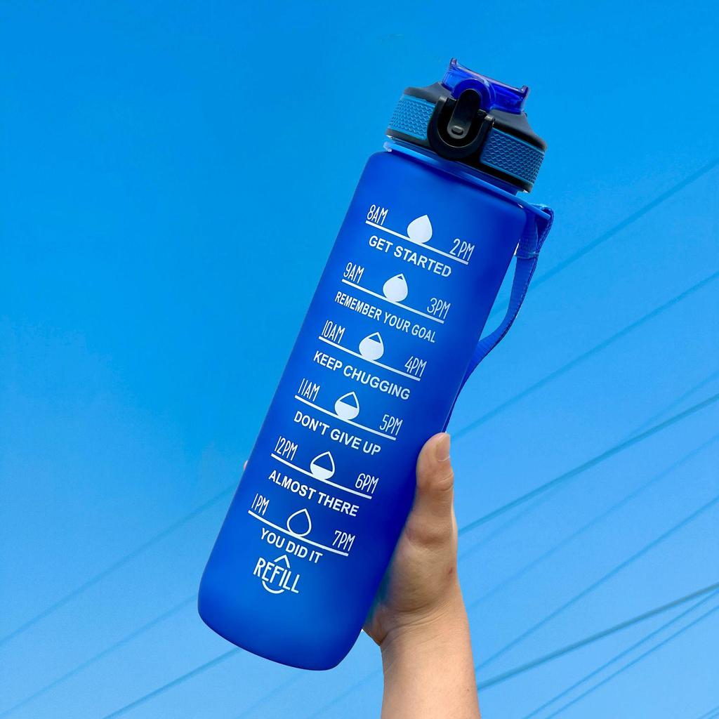 Gradient Large Capacity Sports Water Bottle with Scale, Portable Rope, and Bouncing Straw.