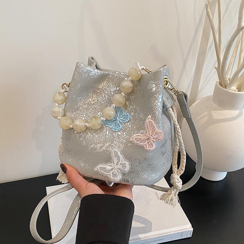 

Popular bag women s new retro embroidery handbag new crossbody bucket women s bag срібний