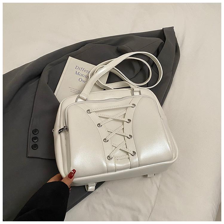 

Hand-held strap pillow bag women s Korean version fashion versatile shoulder bag 2025 new simple casual backpack women s bag белый