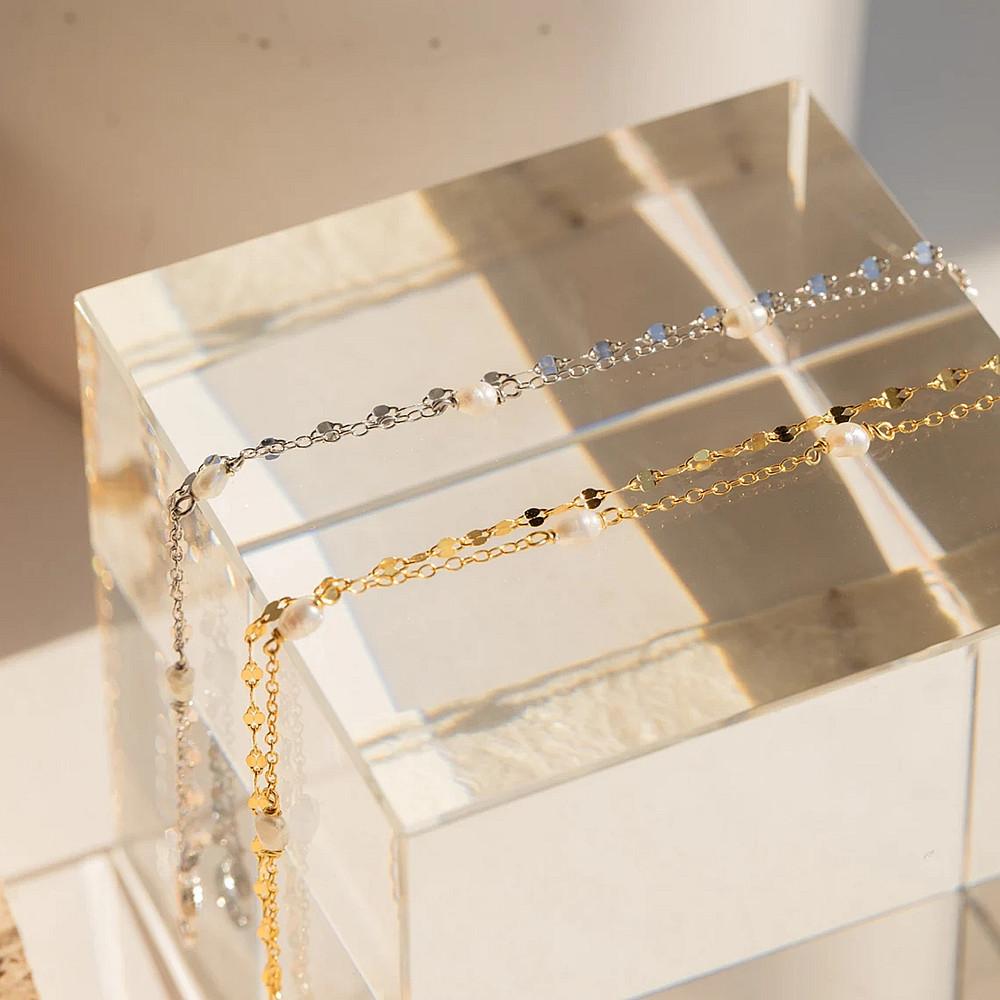 Japanische und koreanische Ins Nische einfacher Stil Design Temperament Schmuck Frauen, doppellagige leichte Luxus Lippenkette Perle vielseitiges Armband