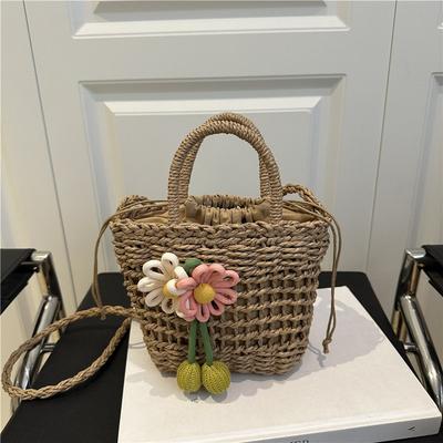 Nieuwe mooie holle rieten weving high-end temperament casual draagbare schouder messenger bag bucket bag vrouw