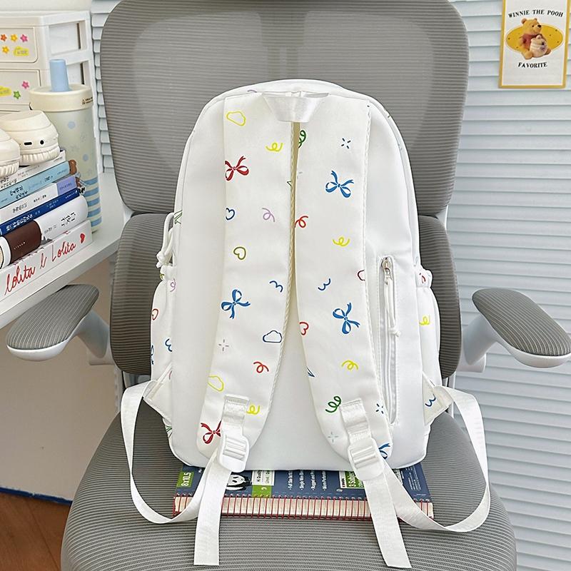 Colorful Doodle Print School Backpack with Multiple Front Pockets Adjustable Straps Casual Daypack for Teens