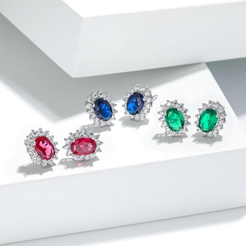 Zodiac Stone Gemstone Stud Earrings: Exaggerated Royal Blue Sapphire Sunflower Design In European and American Style.
