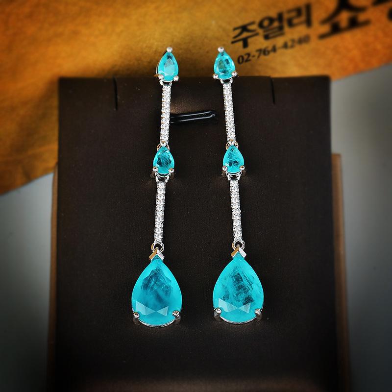 

Новые Популярные Параиба Драгоценный камень Капля воды Ювелирные изделия Длинные серьги-гвоздики Женские Штамп Свадебная вечеринка Ювелирные изделия Подарок