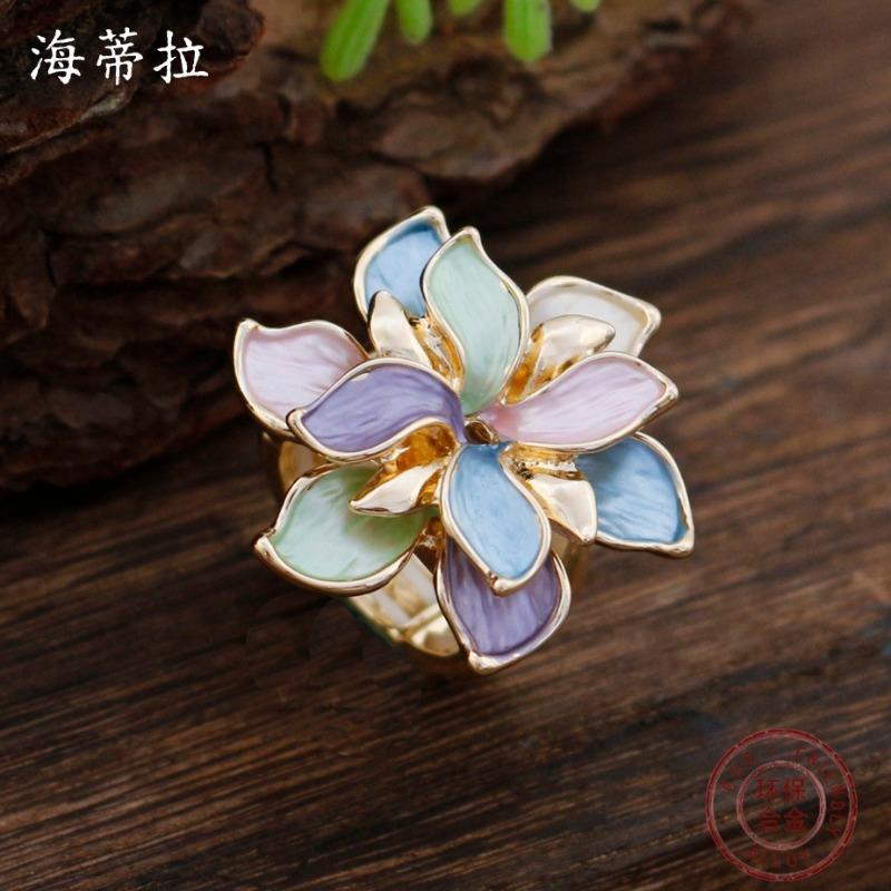 New enamel color hollow geometric daffodil elastic ring women's fashion high-end flower ring