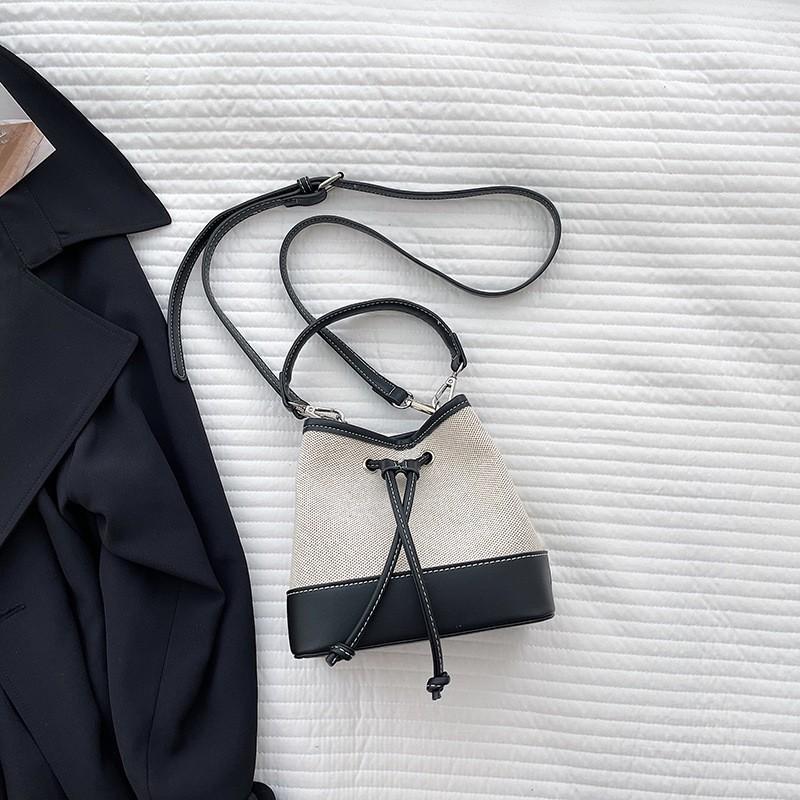 

Korean Hand-carried Canvas Bucket Bag Niche Art Drawstring Pleated Handbag Women s Splicing Fashionable Cross-body