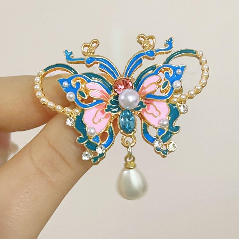 Retro enamel-colored pearl butterfly brooch - High-end, niche-style corsage fastener with anti-glare function, elegant pin.
