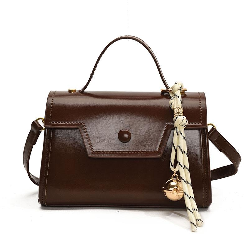 

Ручная переноска Маленькая квадратная сумка Женская Новая модная однотонная сумка через плечо коричневый