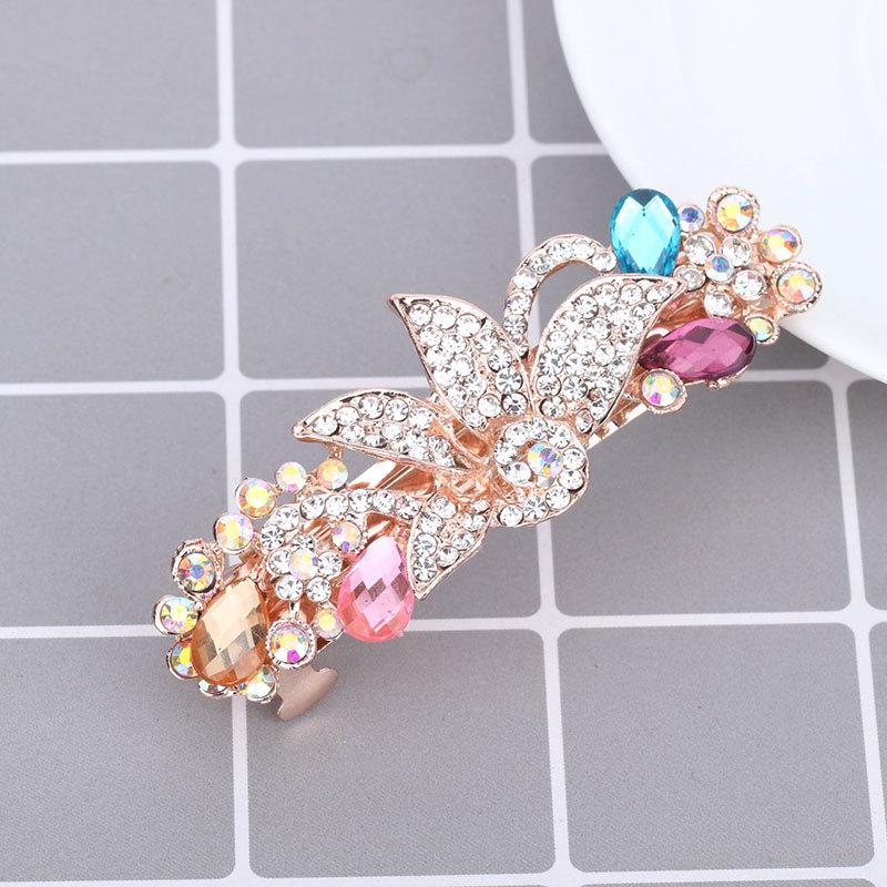 Mengpei Large Crystal Flower Hair Clip: Elegant Rhinestone Ponytail Accessory for Women.