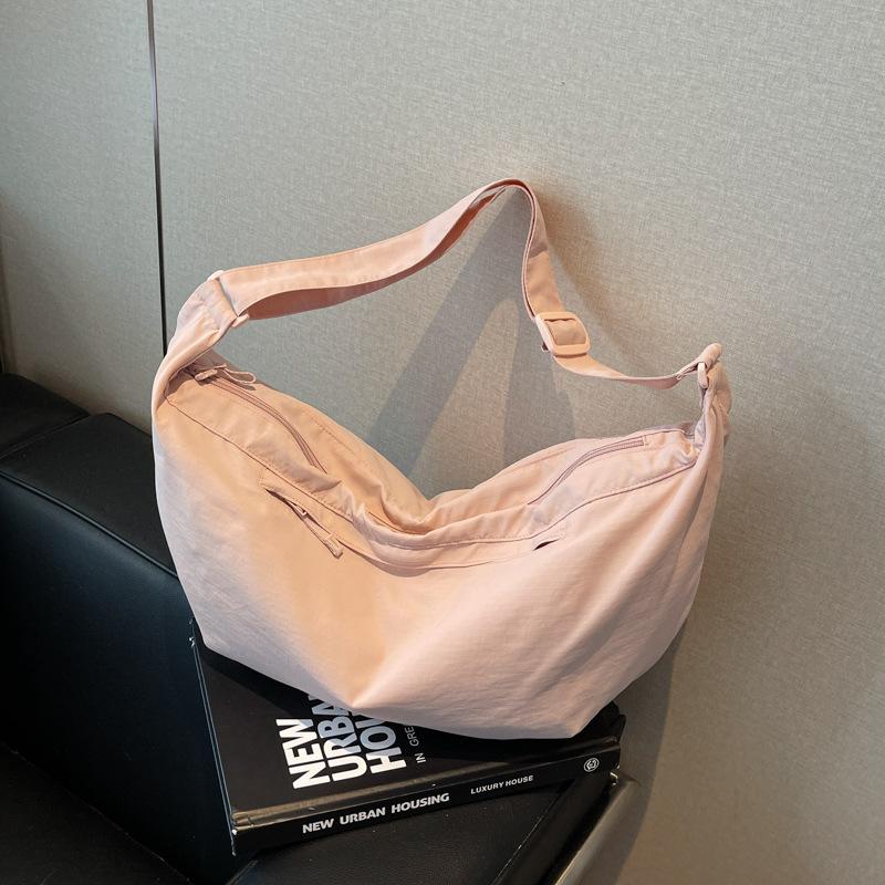 Simple shoulder dumpling bag women's summer lightweight college student messenger bag commuter handbag travel bag