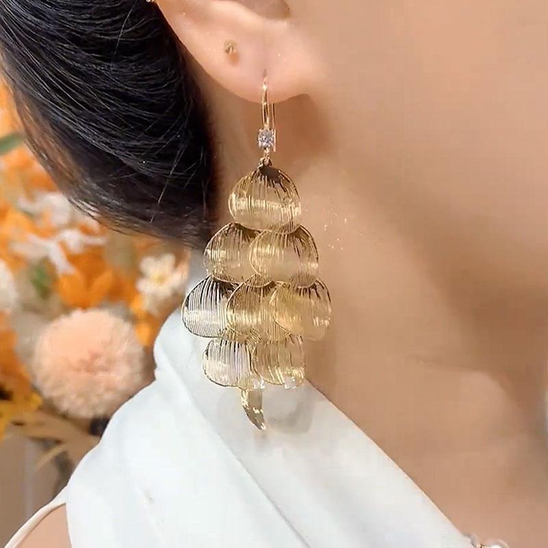 Hollow petal fringed ear hook cold wind earrings light luxury high sense fashion niche temperament earrings