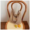 Beach woven bag women's new hollow knitted handbag large capacity shoulder crossbody armpit bag