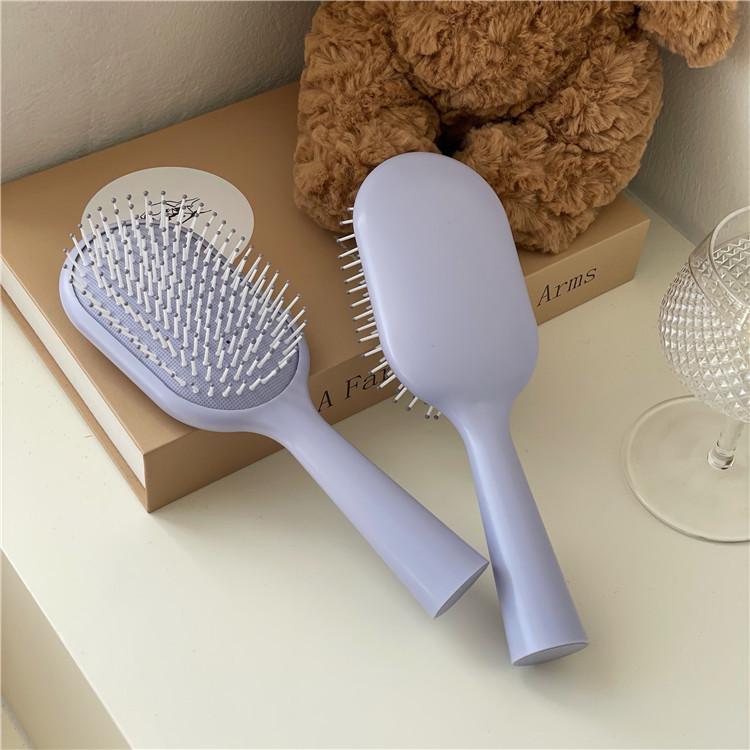 

Стильная портативная расческа-массажер с воздушной подушкой конфетного цвета для студентов и домашнего использования фиолетовый