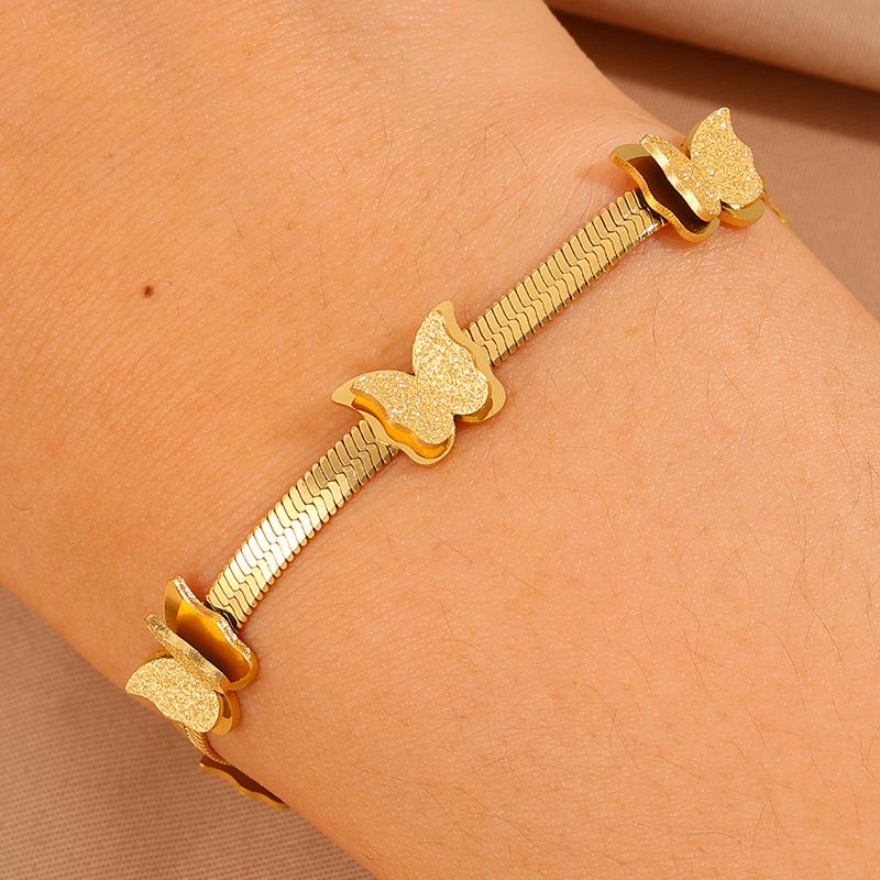 The new titanium steel is girls' high-end light luxury butterfly flat snake blade , personalized design and non-fading jewelry.