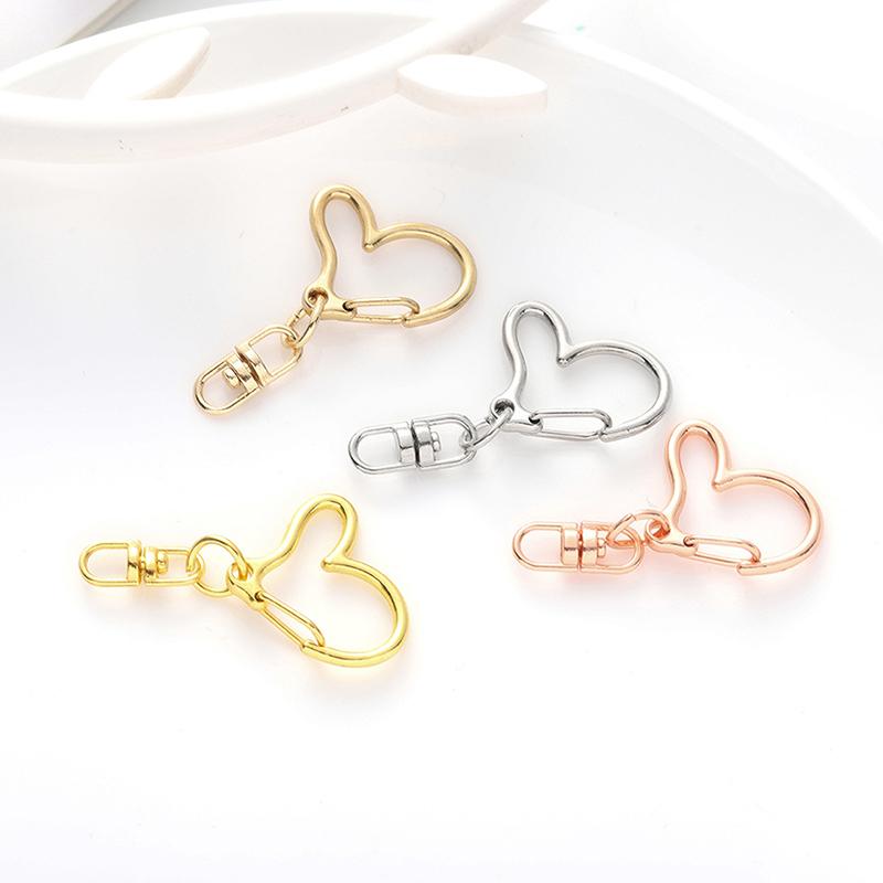 10Pcs Coração Oco Chaveiro Chaveiro Chaveiro Acessórios DIY Fecho Lagosta