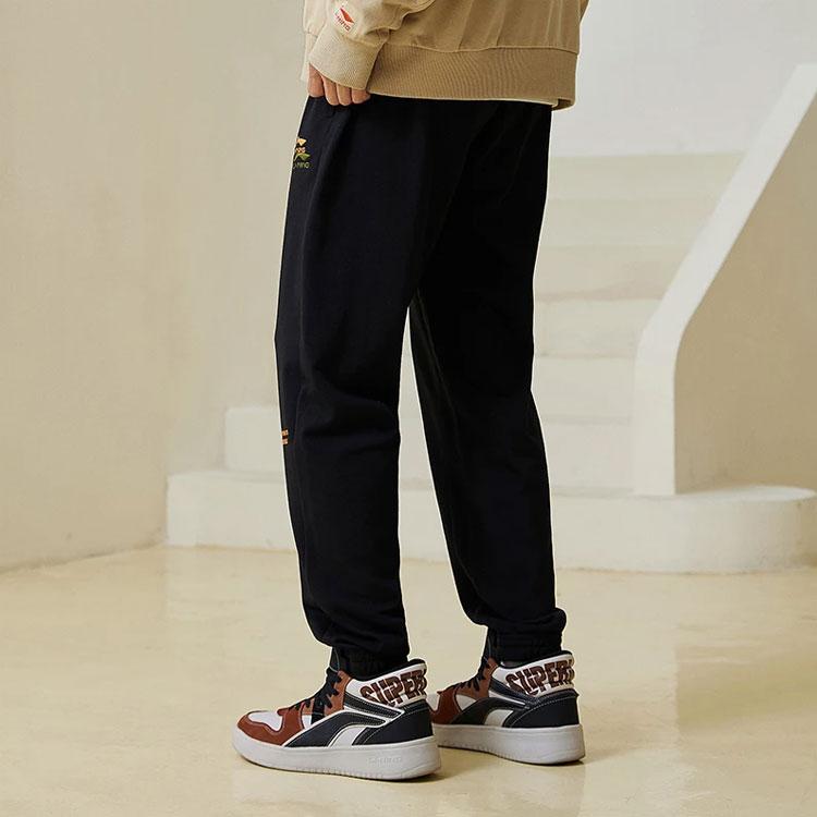 Li Ning Solid Color Loose Fit Embroidered Cuffed Knitted Sports Pants Men Bottoms Black AKLT611-3