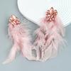 Exaggerated Floral Long Feather Tassel Earrings for Women, An Artistic Ear Accessory.