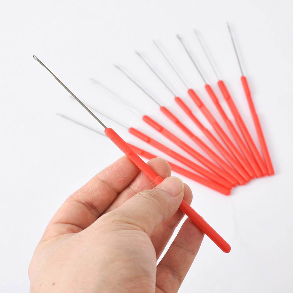 DIY Bead Threading and Knotting Tool with Red Handle for Jewelry Crafting.