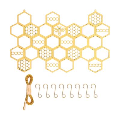 Ohrstecker-Displayständer Pappelmaterial Goldene Bienenstockform Platzsparend Langlebig Ohrring Schmuck