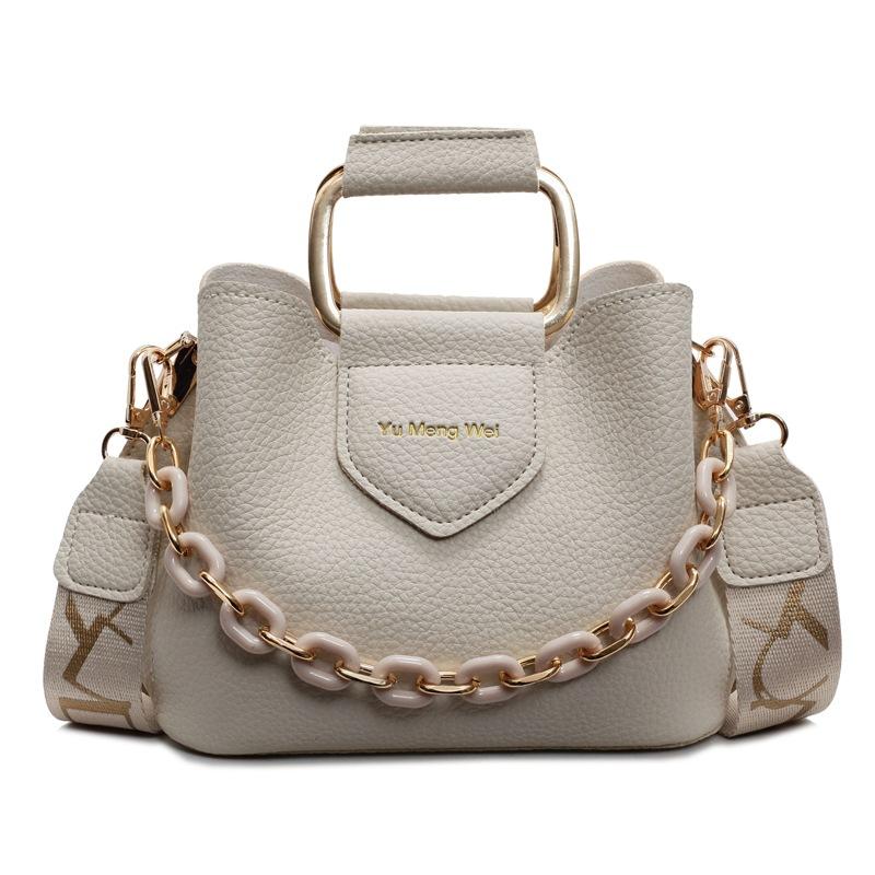 

Korean version of temperament, advanced sense, lychee pattern, portable bucket bag, niche design sense, trendy and versatile single shoulder messenger белый