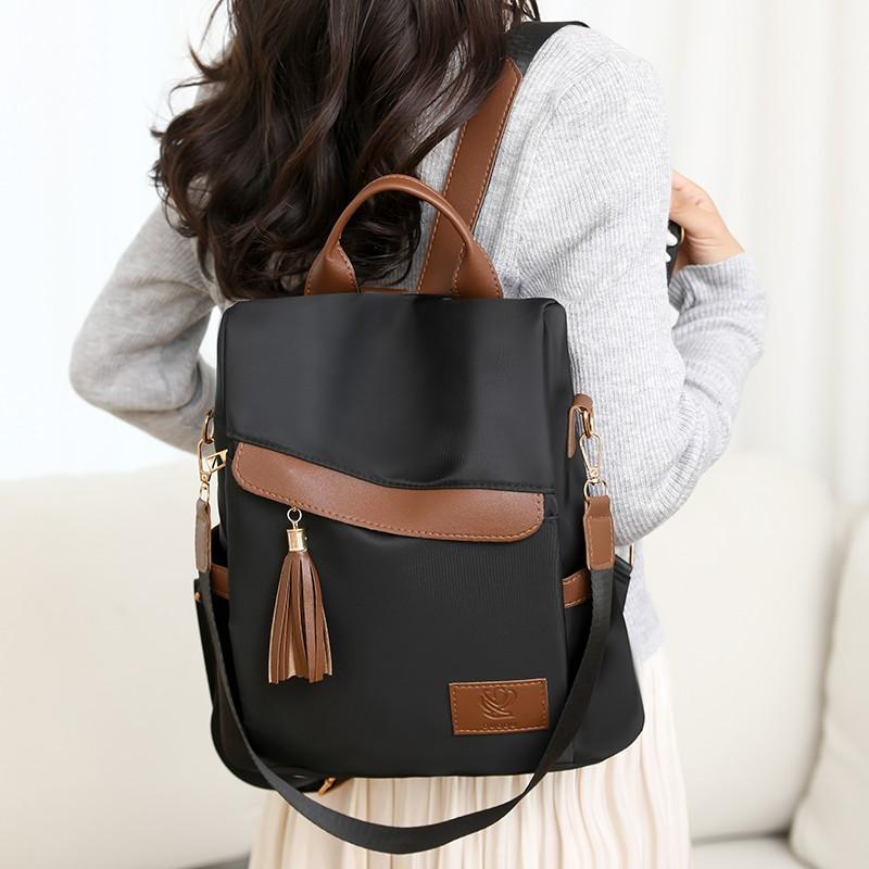 

Backpack women s new fashionable large-capacity travel backpack simple casual student schoolbag чёрный