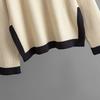 GMXIA Knitwear Set for Women's Autumn Design: A Two-piece Outfit Featuring A Contrasting Color Round-neck Top and A Slit Skirt, Exuding Elegance