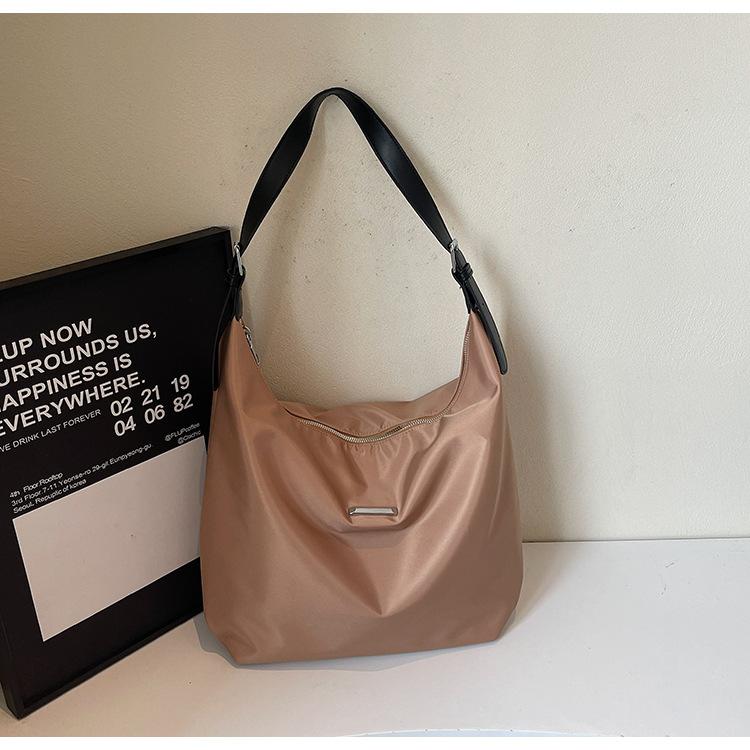 

Korean version of foreign style 2025 leisure bag, new large-capacity Oxford Buttot bag, female student commuting shoulder oblique span bag хаки