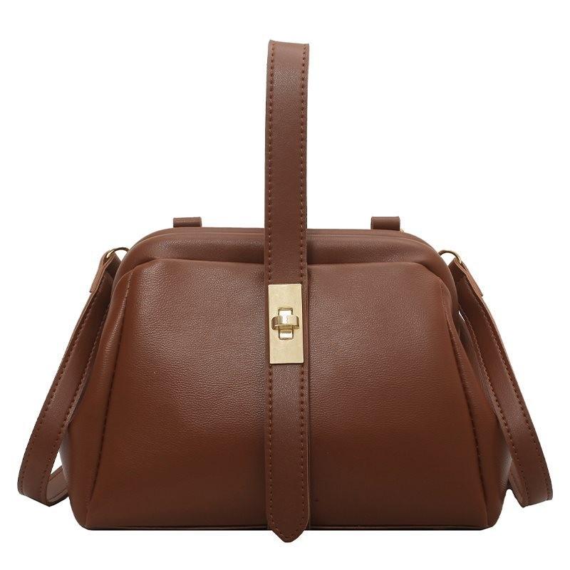 Elegant Vintage Shoulder Bag For Women Featuring Unique Saddle Shape Soft Material