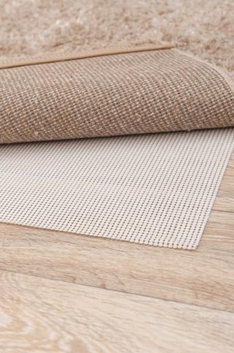 Protiskluzová podložka pod koberec 60x120cm bílá