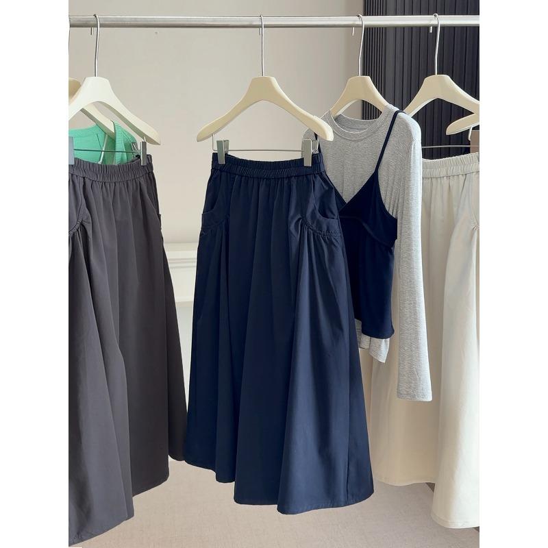 Spring and Autumn new elastic waist loose pocket skirt women's high waist A-shaped skirt big pendulum medium and long umbrella skirt